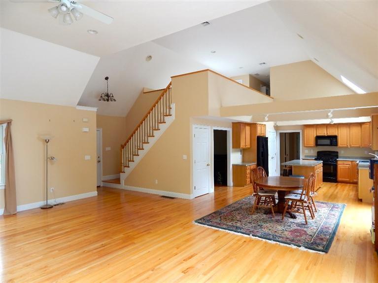 367 Service Road Sandwich, MA 02537 - Photo 17 of 34 a view of a livingroom with furniture wooden floor and a rug