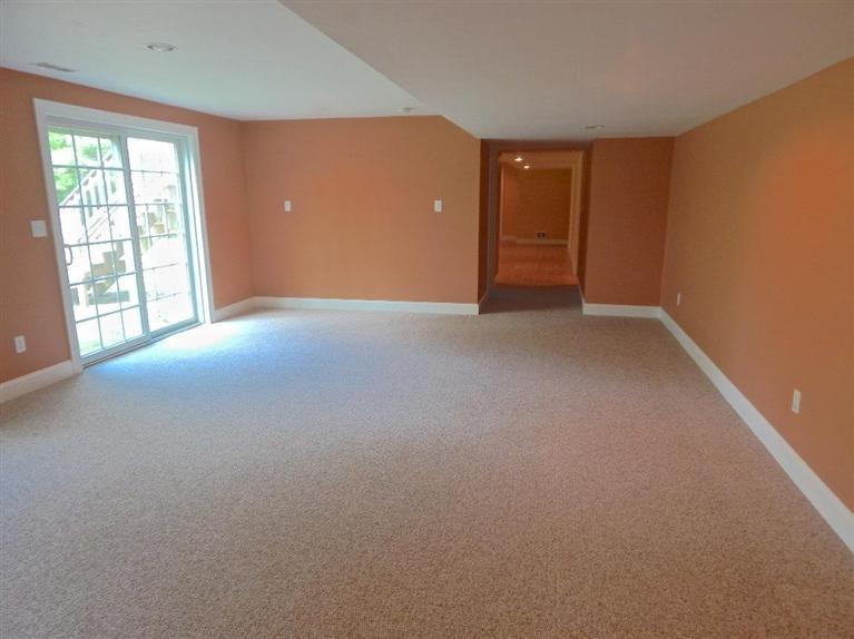 367 Service Road Sandwich, MA 02537 - Photo 30 of 34 a view of an empty room with a window