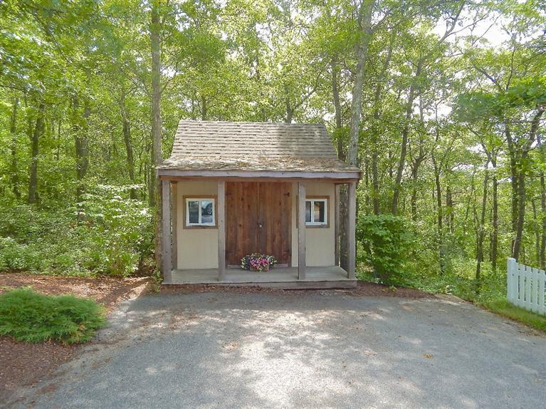 367 Service Road Sandwich, MA 02537 - Photo 3 of 34 a view of a house with a yard and large tree