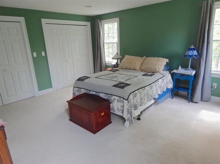 367 Service Road Sandwich, MA 02537 - Photo 31 of 34 a bedroom with a bed and a window