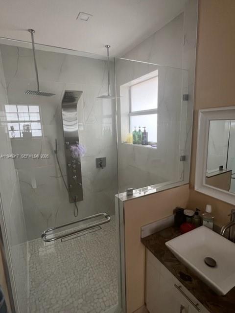 2530 Southwest 153rd Pass Miami, FL 33185 - Photo 8 of 8 a bathroom with a sink and mirror