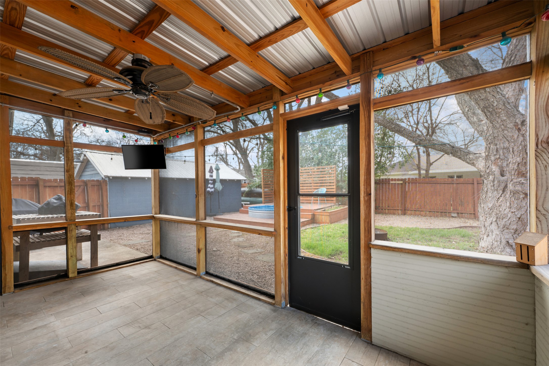 1218 South Myrtle Street Georgetown, TX 78626 - Photo 31 of 37 Unfurnished sunroom featuring ceiling fan and plenty of natural light