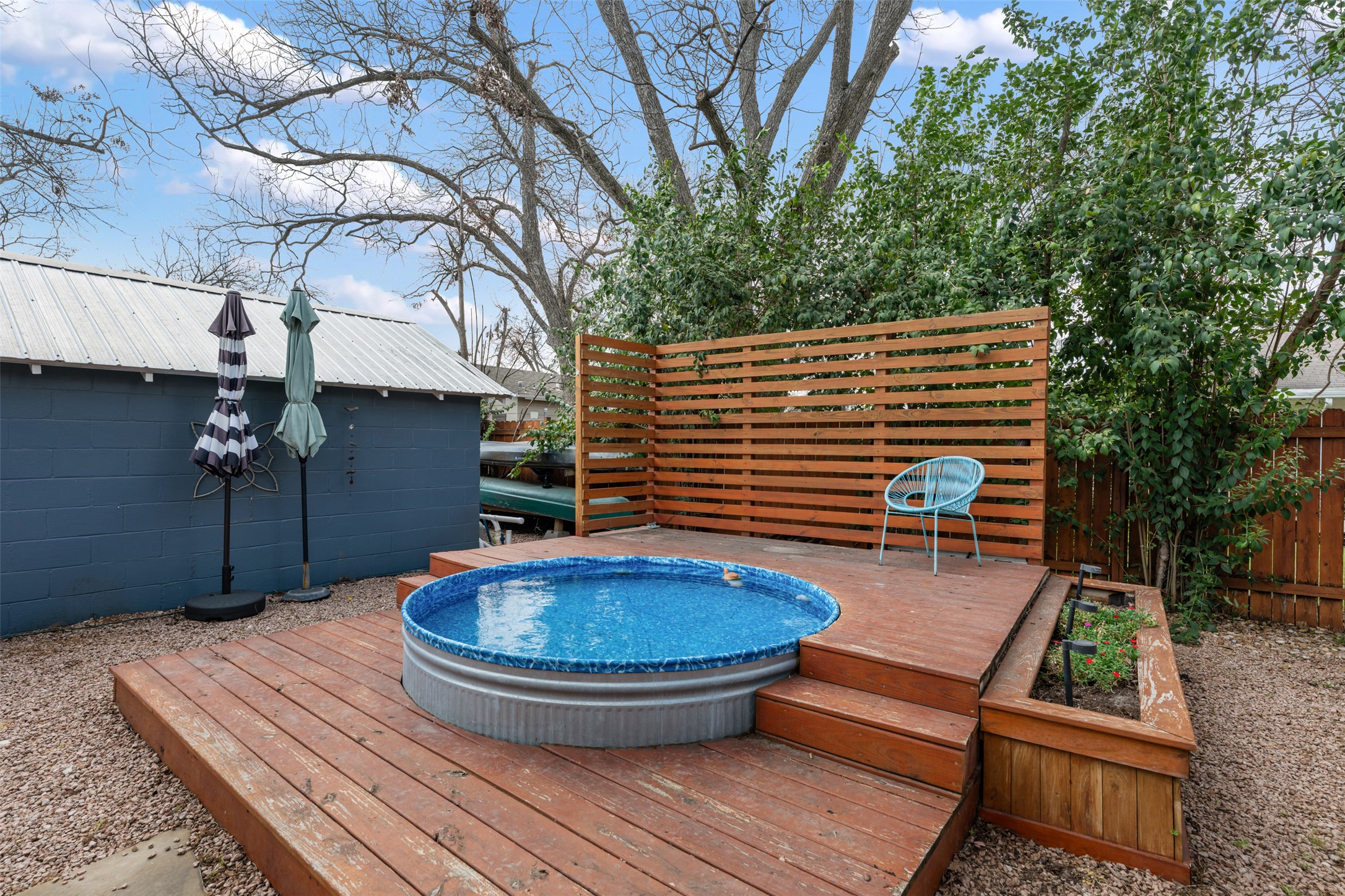 1218 South Myrtle Street Georgetown, TX 78626 - Photo 34 of 37 View of swimming pool featuring a wooden deck