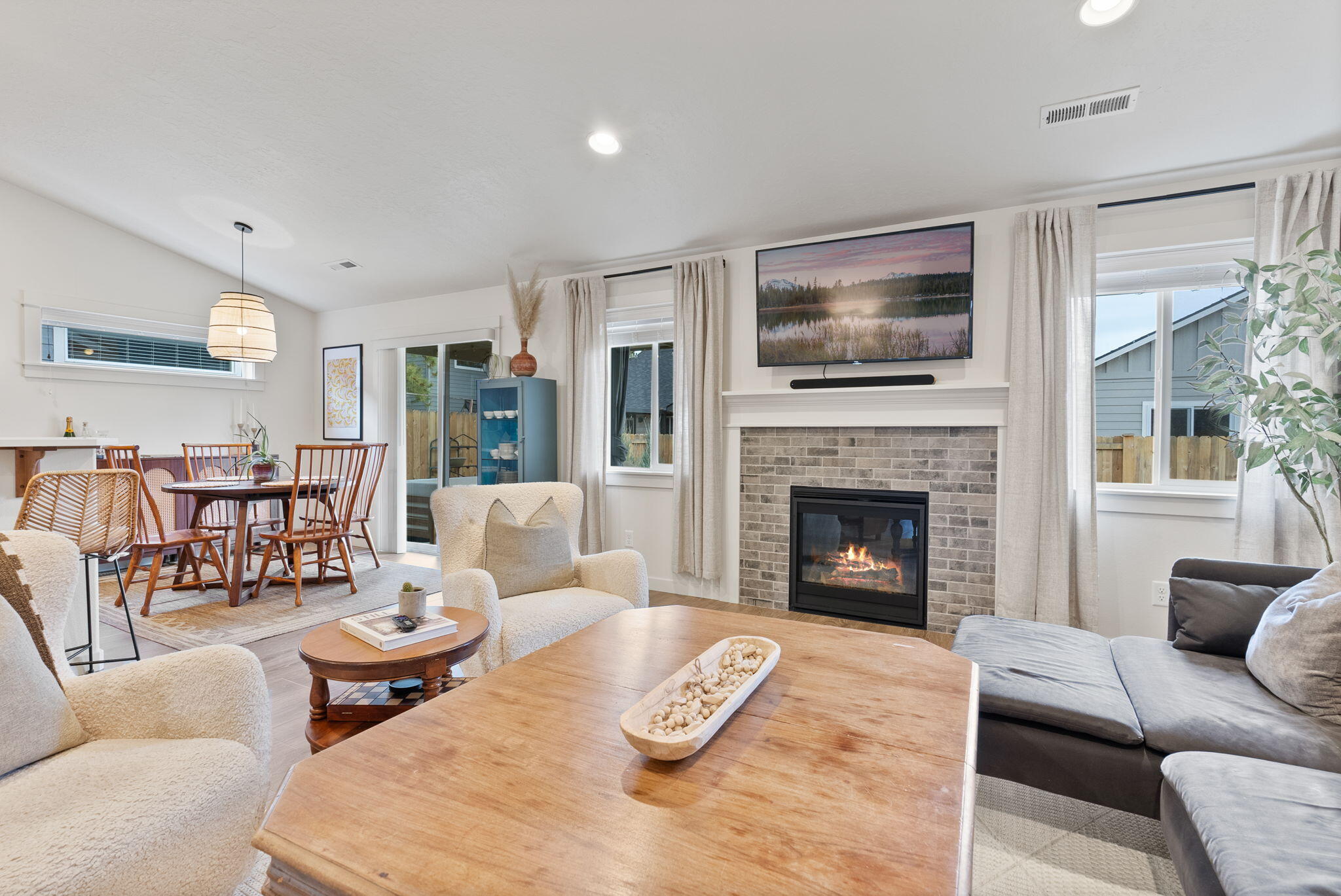 632 North Reed Street Sisters, OR 97759 - Photo 2 of 36 a living room with furniture and a fireplace