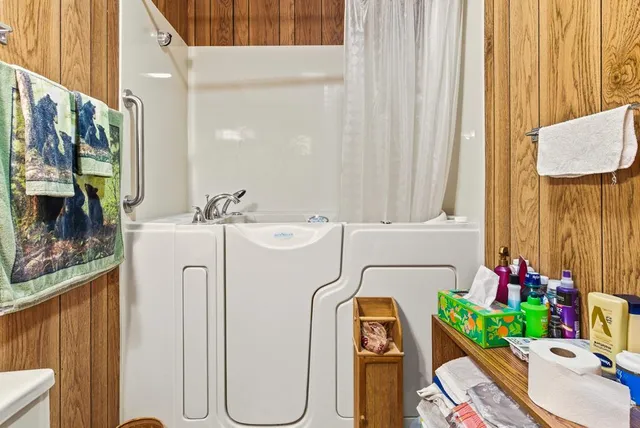 a utility room with a sink washer and dryer
