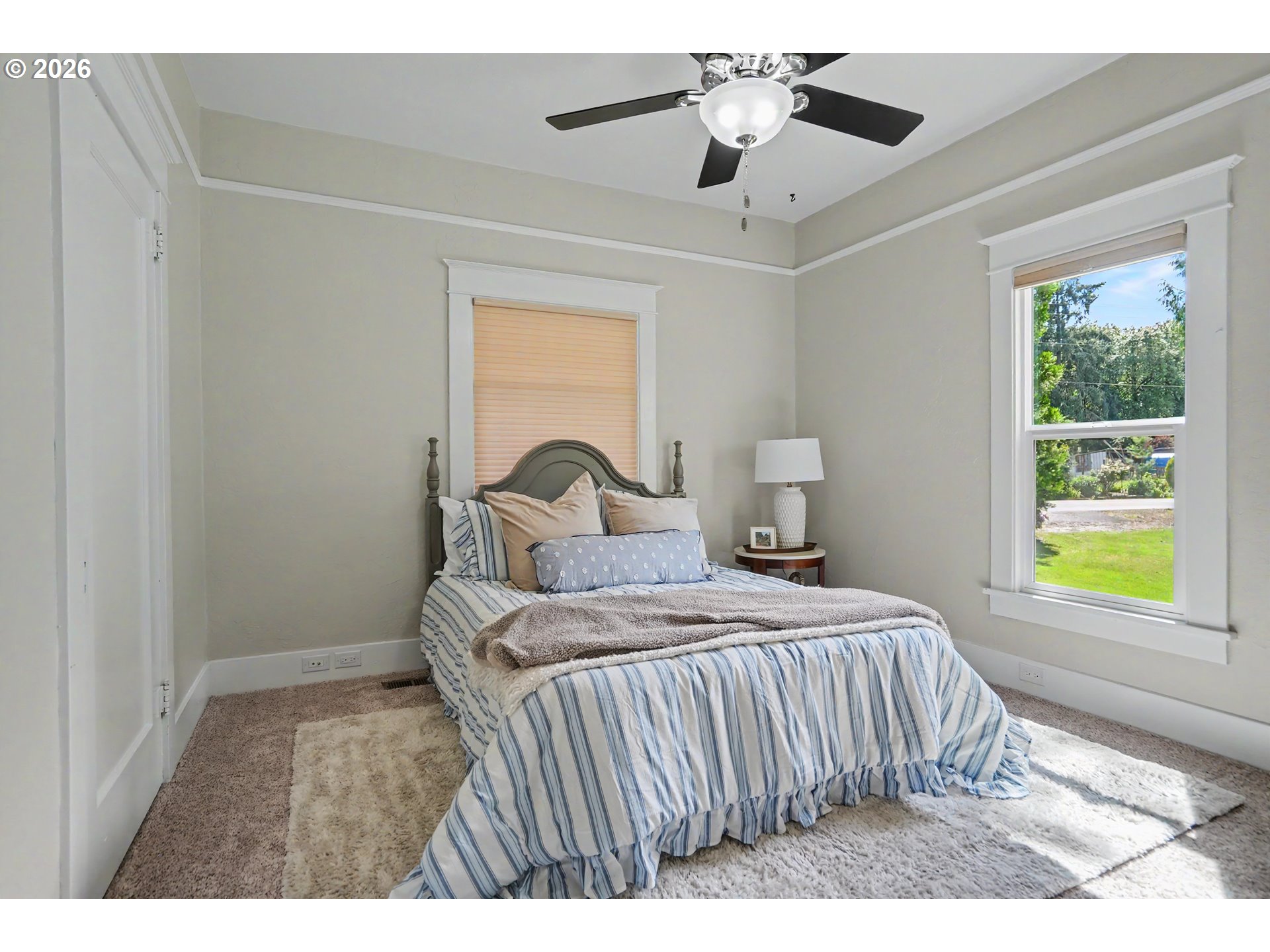 15055 Southeast Foster Road Dayton, OR 97114 - Photo 25 of 47 a bedroom with a bed and a window