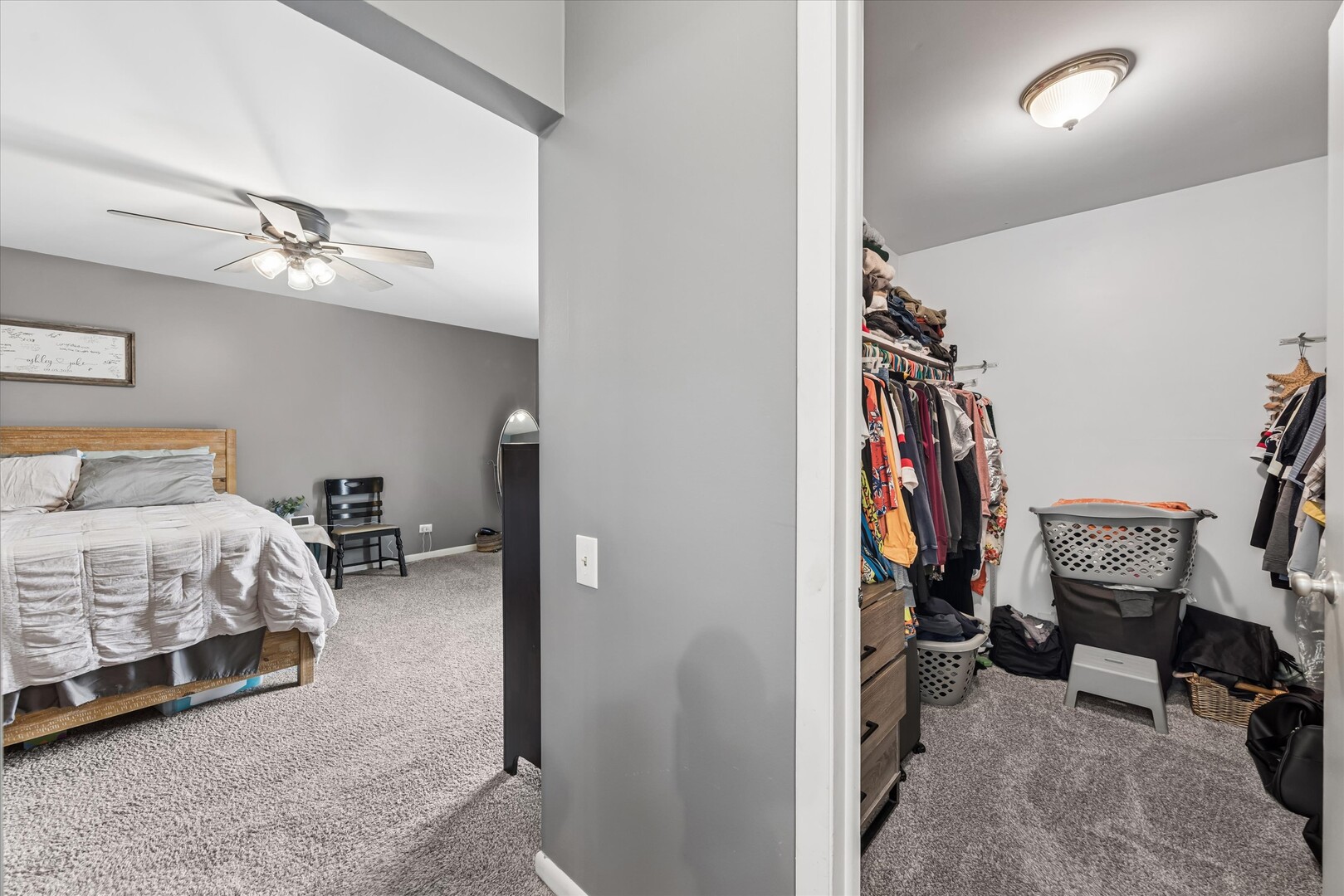 20 Oak Tree Court, Unit 20 Elmhurst, IL 60126 - Photo 21 of 35 a view of a bedroom with a baby crib and a couch