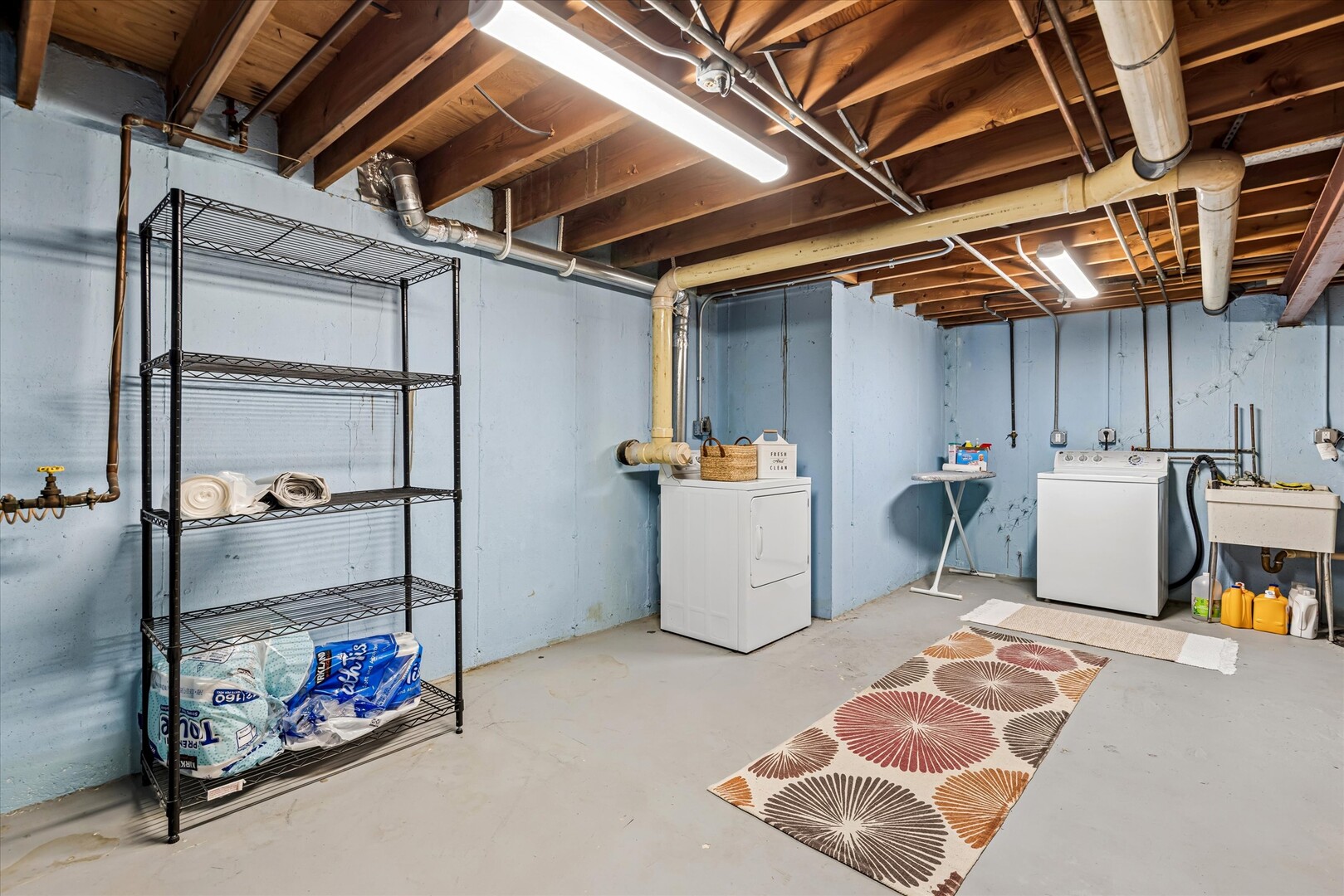 20 Oak Tree Court, Unit 20 Elmhurst, IL 60126 - Photo 28 of 35 a storage room with water heater and racks