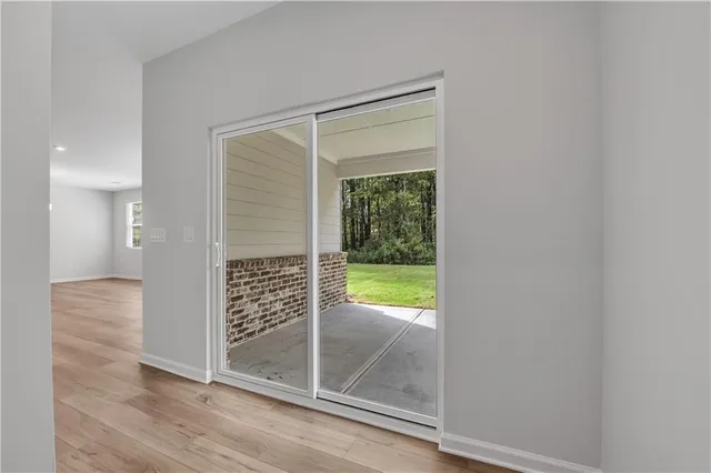 a bathroom with a glass shower door