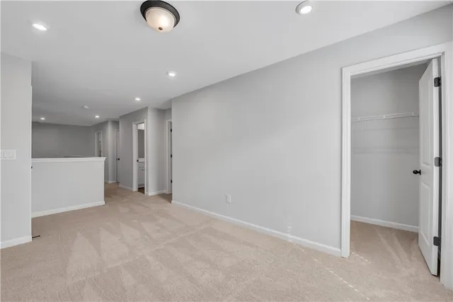 a view of a storage & utility room with closet