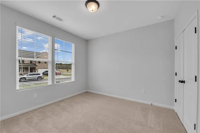 an empty room with windows