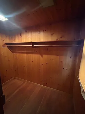 an empty room with a empty space and a window