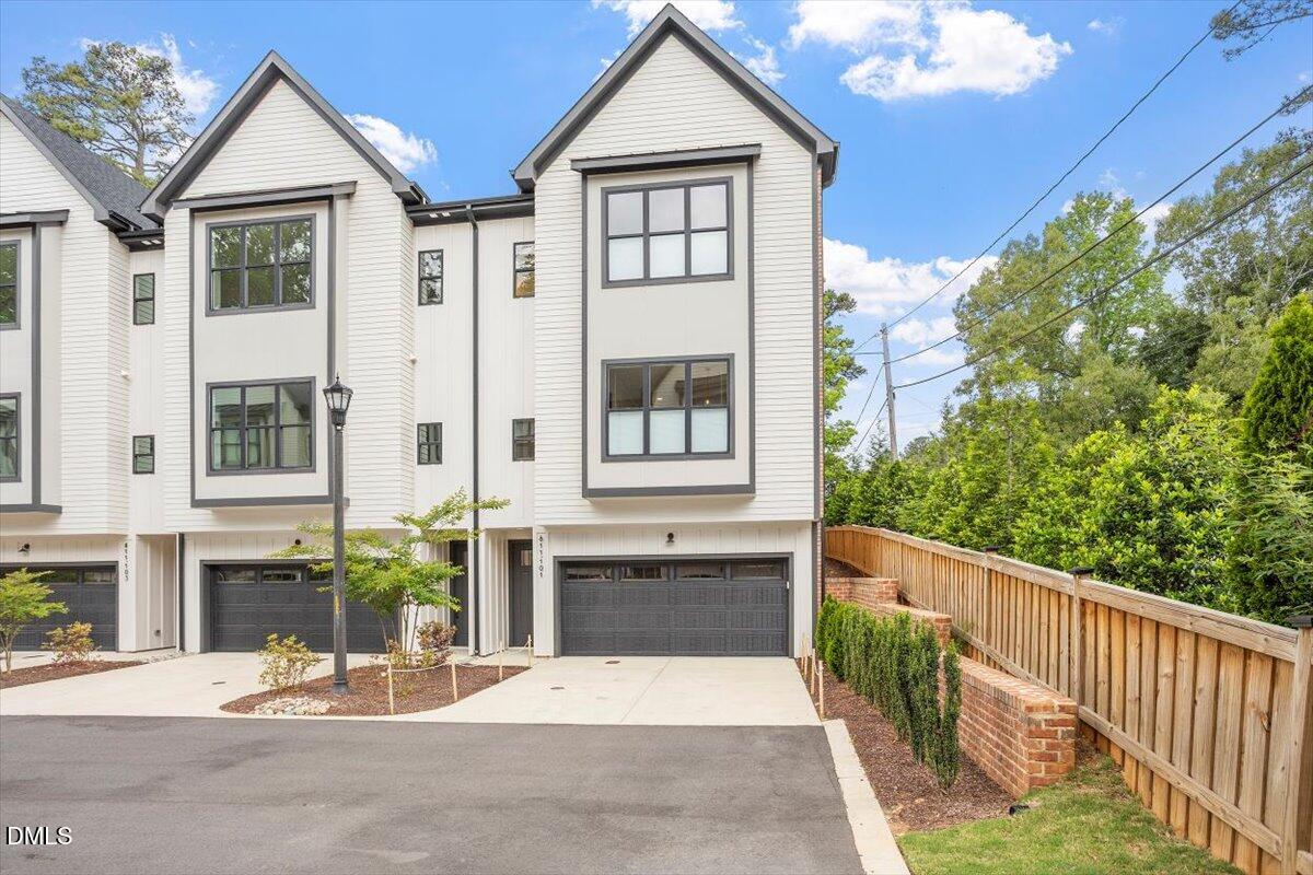 811 Maple Berry Lane, Unit 101 Raleigh, NC 27607 - Photo 2 of 45 a view of house with outdoor space and porch