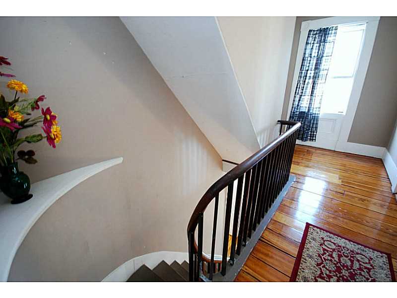 216 Spring Street Newport, RI 02840 - Photo 12 of 25 Other. Beautiful staircase on second level, and first level has a nice wide entry foyer!