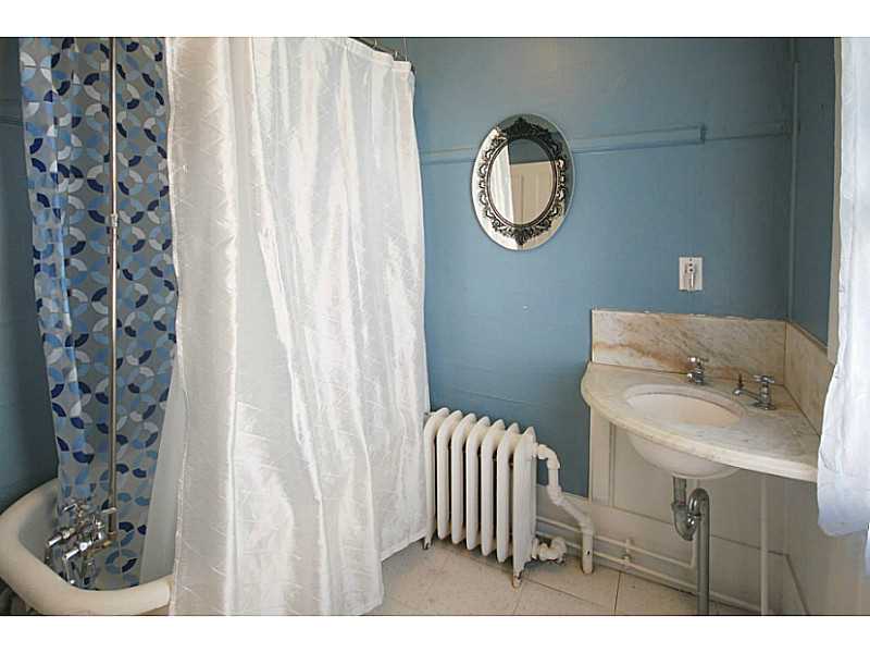 216 Spring Street Newport, RI 02840 - Photo 20 of 25 Bathroom. Clawfoot tub and corner marble sink, and there is an additional 2nd floor full bath!