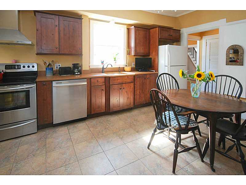 216 Spring Street Newport, RI 02840 - Photo 7 of 25 Kitchen. Sunny Eat in Kitchen is 12 x 17.