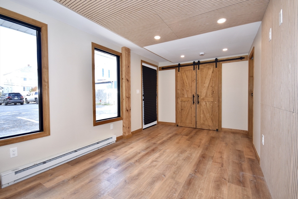 130 Swindells Street, Unit 2 Fall River, MA 02723 - Photo 2 of 7 a view of an empty room with a window