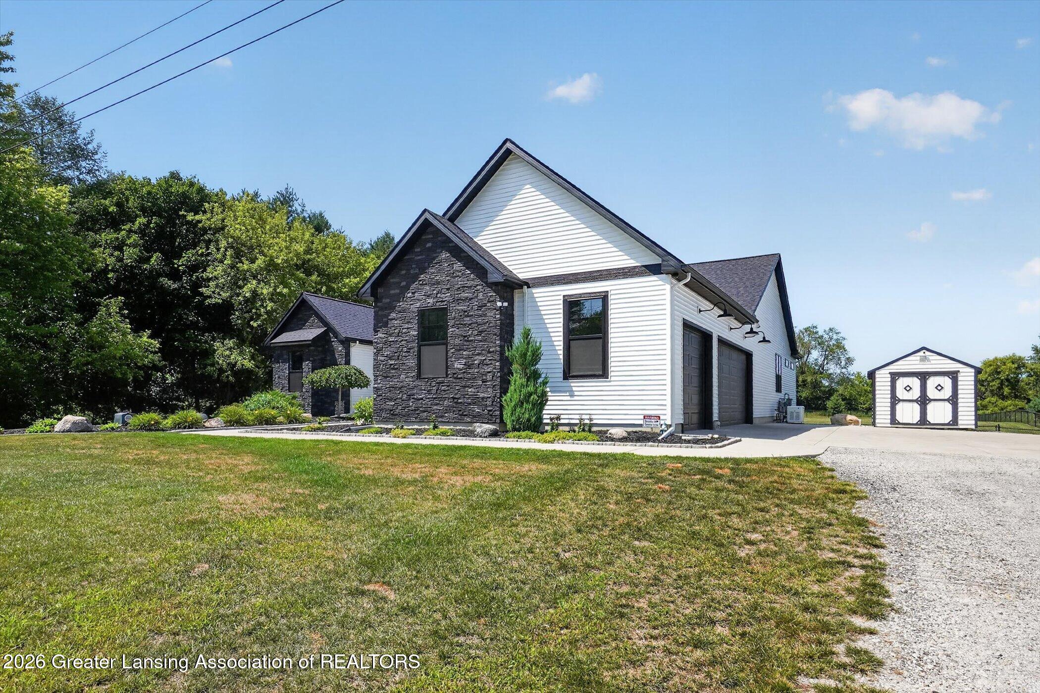 3805 Zimmer Road Williamston, MI 48895 - Photo 4 of 77 04-3805 -Zimmer-Rd-WindowStill-Photograp