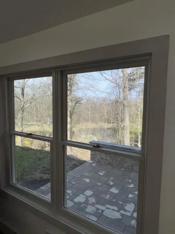 a view of backyard with green space