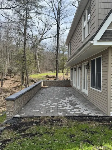 a view of backyard with green space