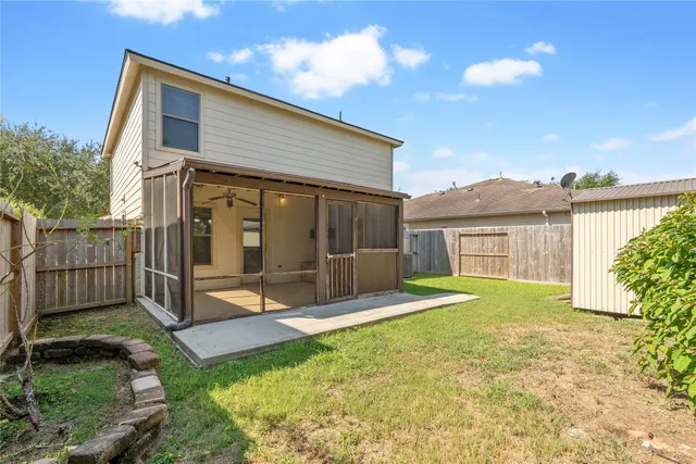 a backyard of a house with lots of green space