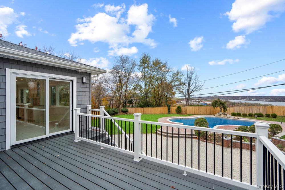 52 Woodland Road Roslyn, NY 11576 - Photo 17 of 23 a view of a balcony with wooden floor