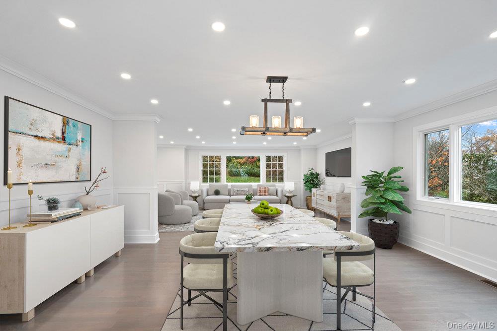 52 Woodland Road Roslyn, NY 11576 - Photo 18 of 23 a view of a dining room with furniture window and outside view
