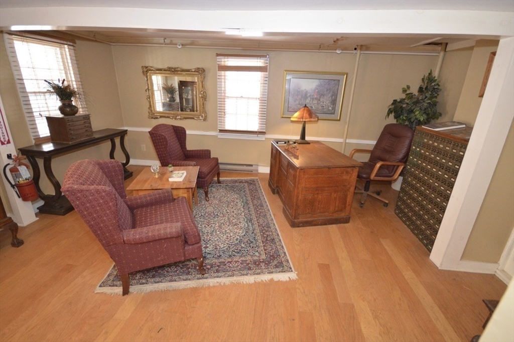 720 Kearsarge Road Conway, NH 03845 - Photo 6 of 21 a living room with furniture and a window