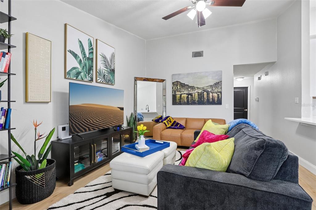 1525 Kestrel Way Brandon, FL 33511 - Photo 12 of 48 a living room with furniture and a potted plant