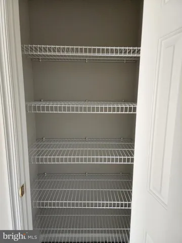 a view of a room with racks on the wall