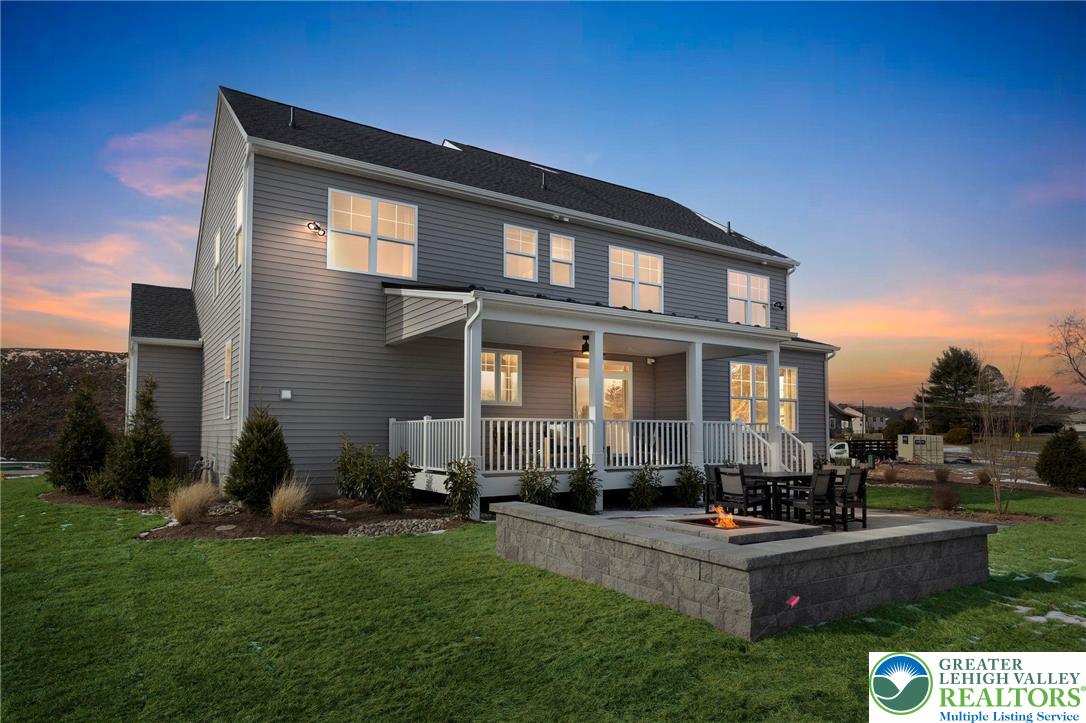 5095 Maple Rdg Way, Unit HOMESITE 13 Emmaus, PA 18049 - Photo 2 of 3 a front view of a house with a yard