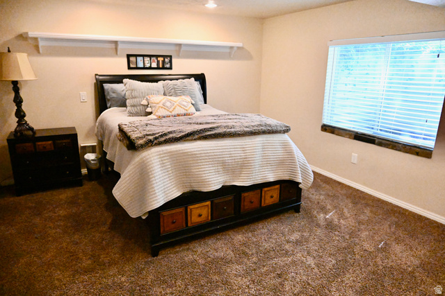 314 Brown Farm Lane Draper, UT 84020 - Photo 30 of 57 Carpeted bedroom featuring a large window with blinds and a built-in window ledge