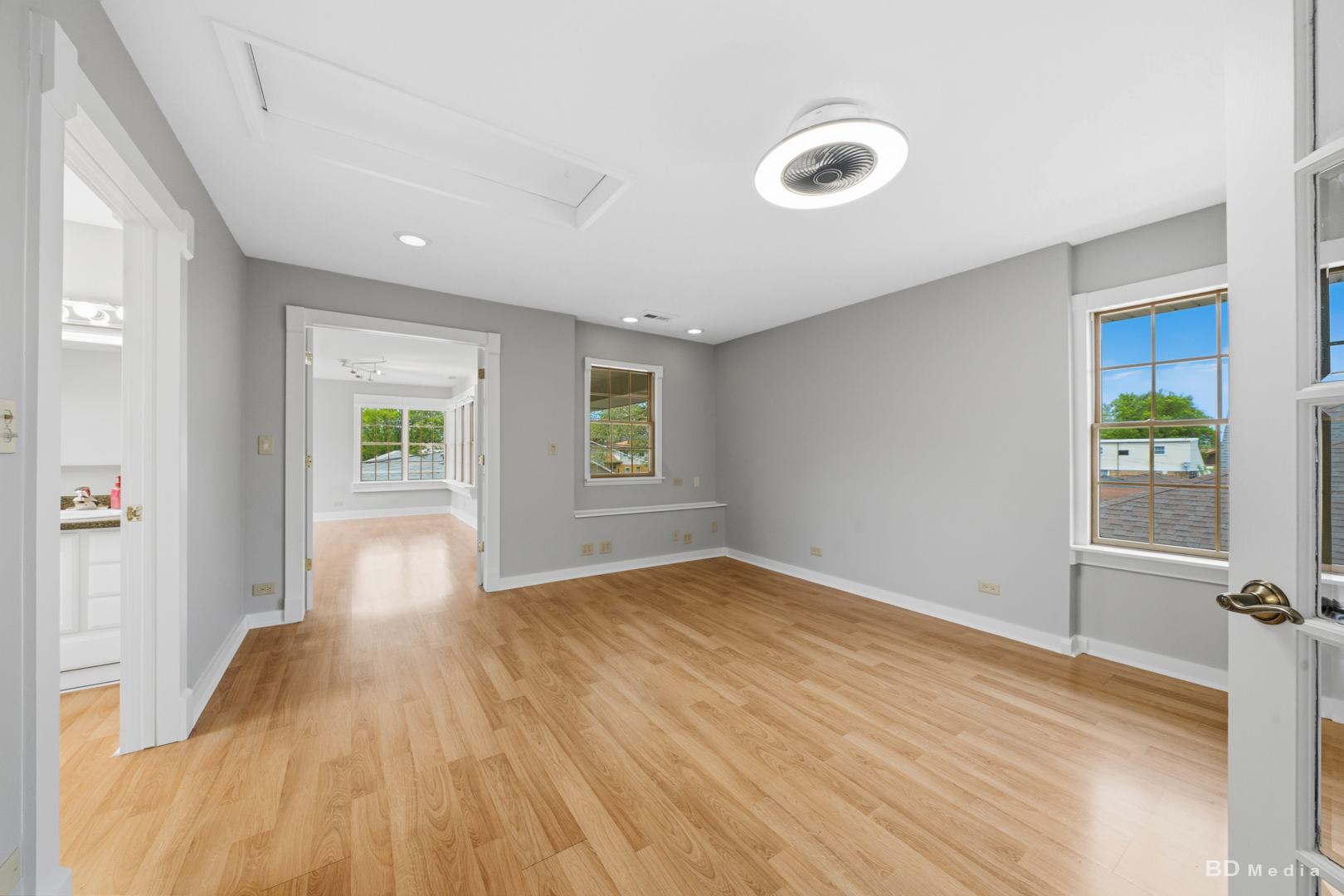 10428 South Springfield Avenue Chicago, IL 60655 - Photo 23 of 43 a view of livingroom with hardwood floor and a ceiling fan