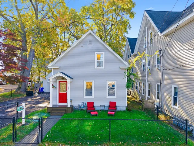 a front view of house with yard