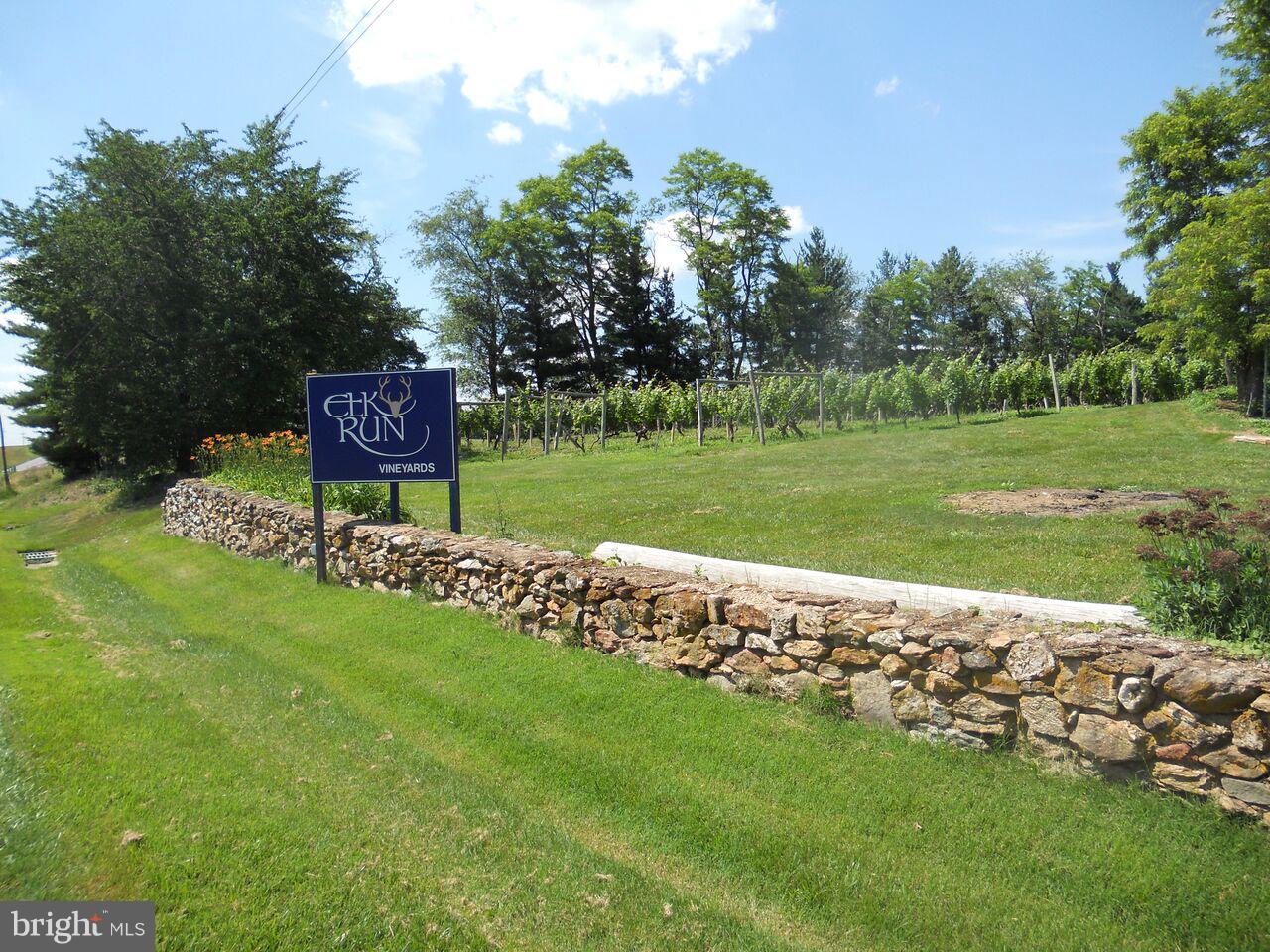 15137 Liberty Road Mount Airy, MD 21771 - Photo 12 of 18 a sign board with a house in the background