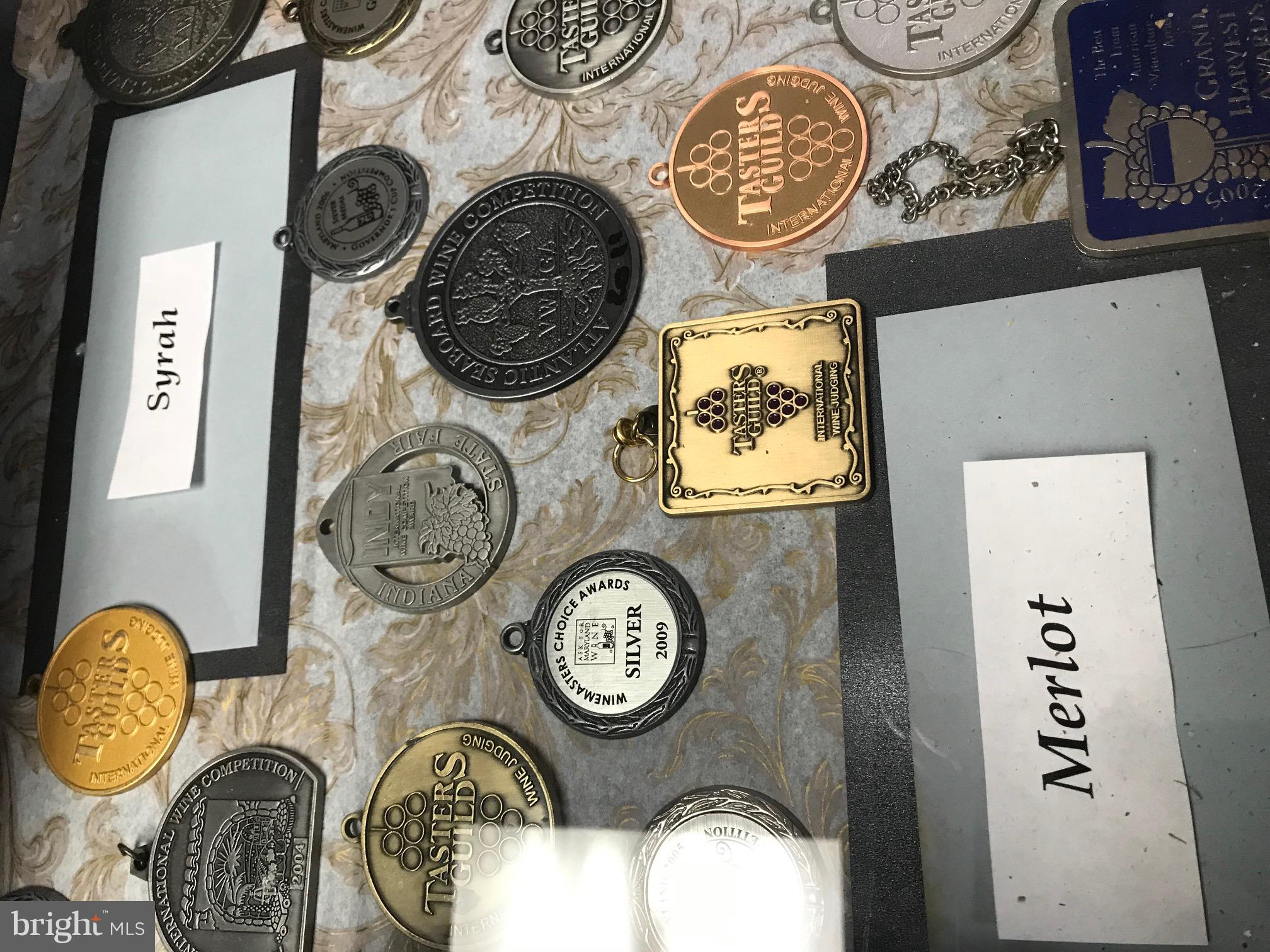 15137 Liberty Road Mount Airy, MD 21771 - Photo 4 of 18 a clock on a wall next to a wooden table