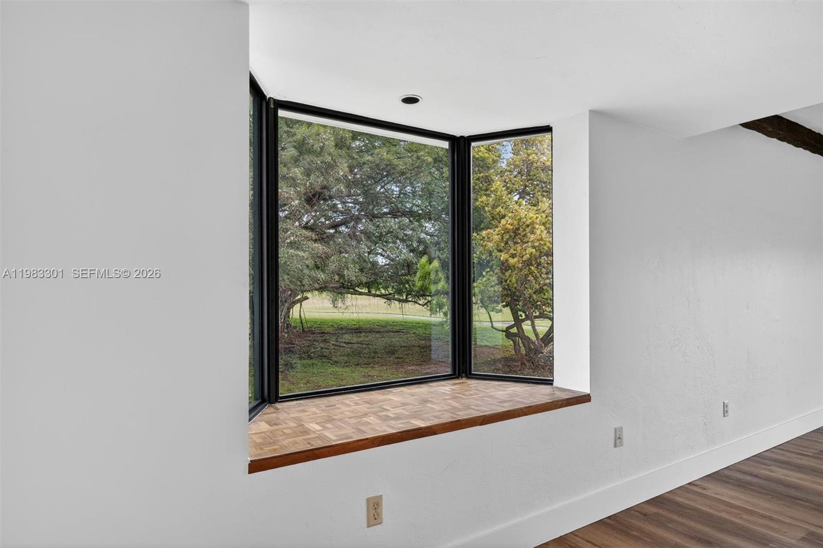6190 Southwest 90th Court, Unit 1K Miami, FL 33173 - Photo 14 of 49 a view of a room that has a large window