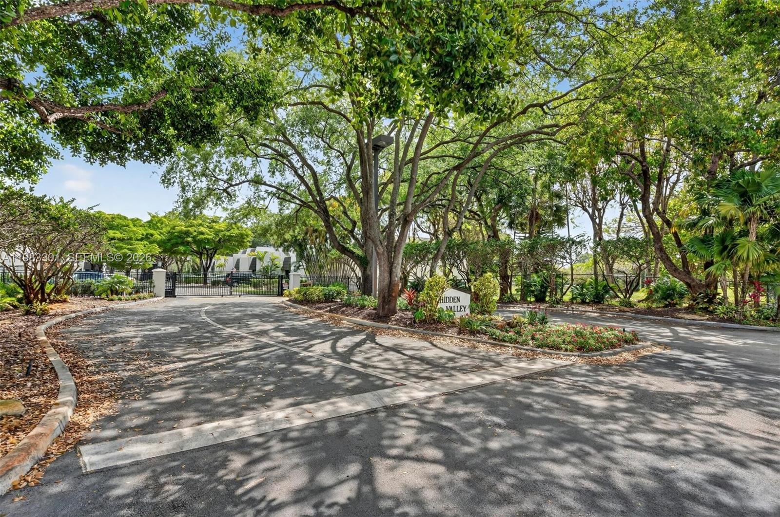 6190 Southwest 90th Court, Unit 1K Miami, FL 33173 - Photo 38 of 49 a view of a tree in front of a house