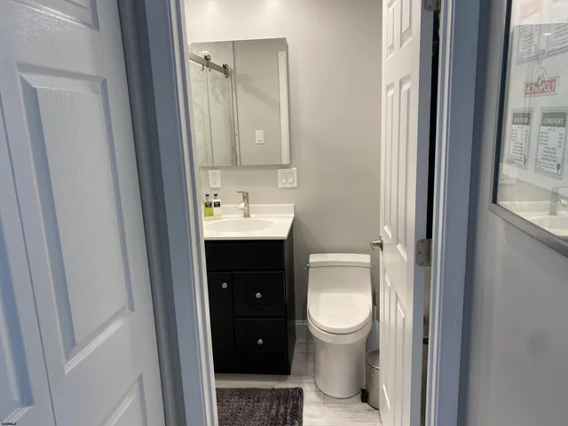 a bathroom with a sink double vanity and shower