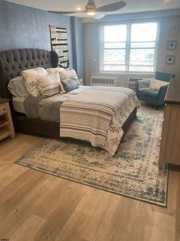 a kitchen with granite countertop a stove and a refrigerator