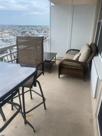 a bedroom with a bed and dresser