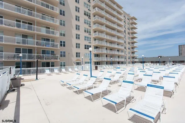 a view of a terrace with chairs