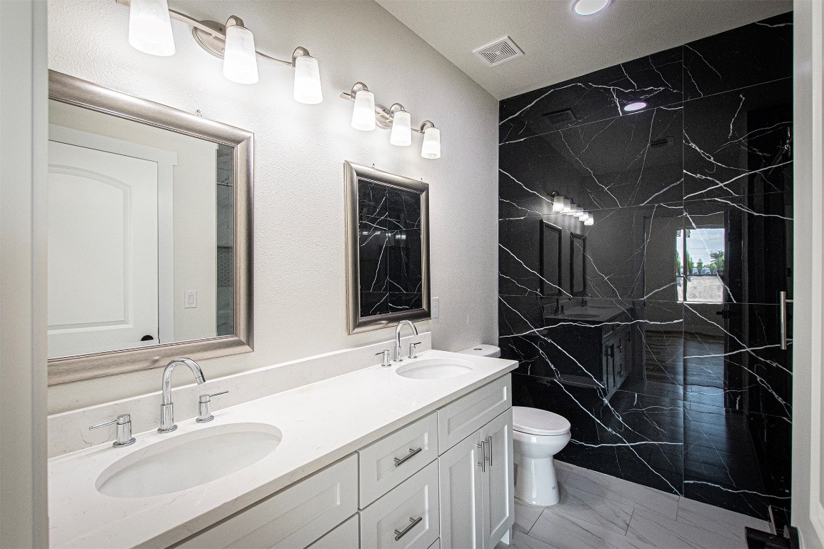 106 Passion Vine Rd Dale Dale, TX 78616 - Photo 11 of 23 a bathroom with a sink toilet and shower