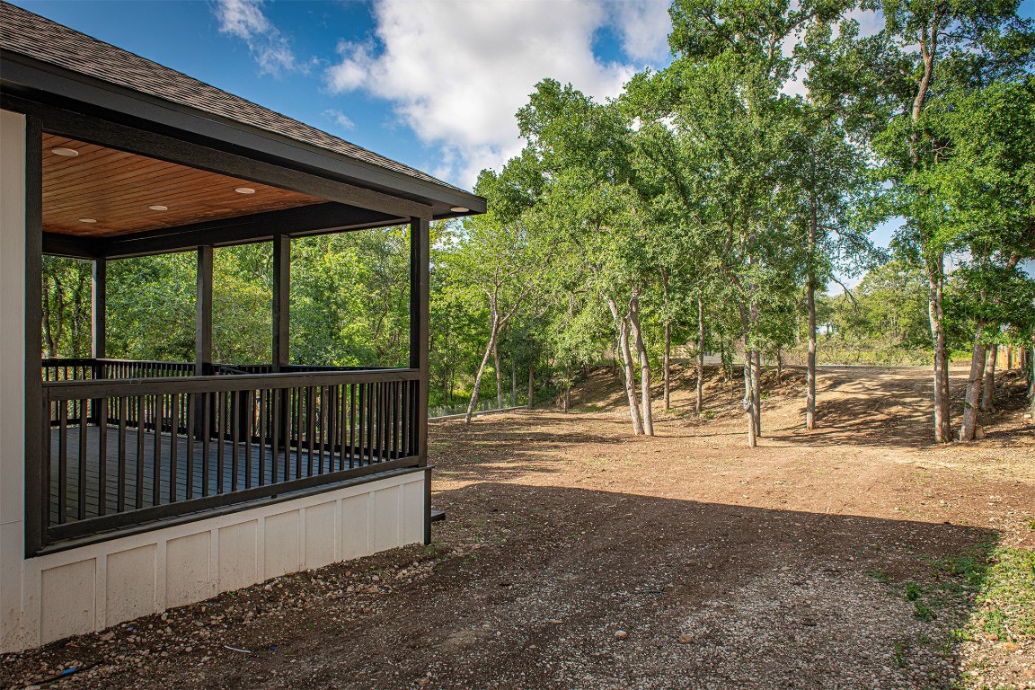 106 Passion Vine Rd Dale Dale, TX 78616 - Photo 19 of 23 a view of a yard with wooden fence