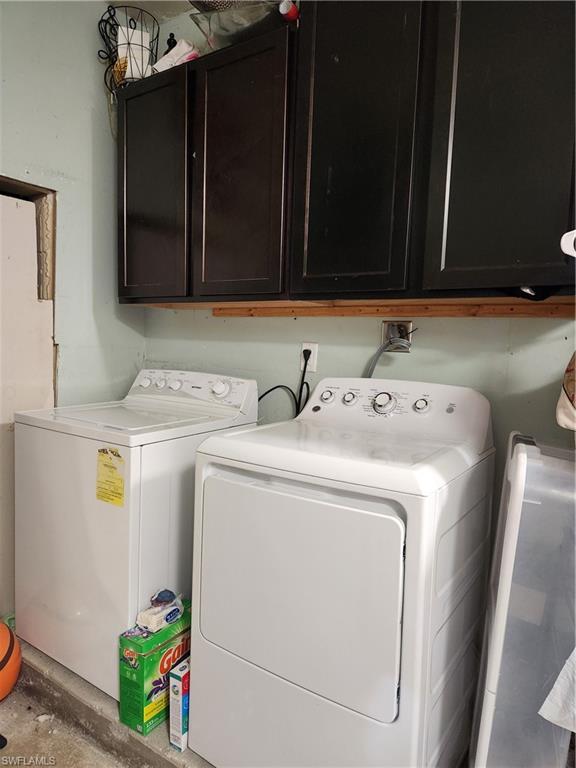 5214 Carlton Street Naples, FL 34113 - Photo 14 of 20 a utility room with dryer and washer