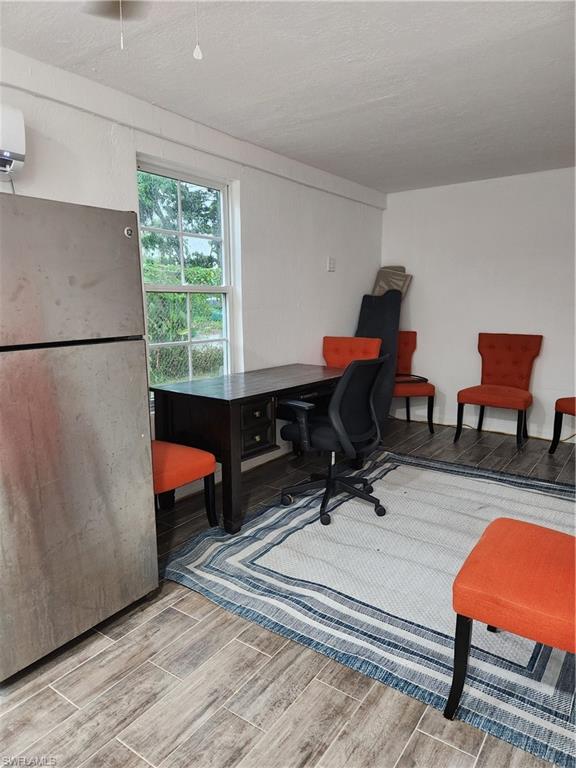 5214 Carlton Street Naples, FL 34113 - Photo 15 of 20 a workspace with furniture and window