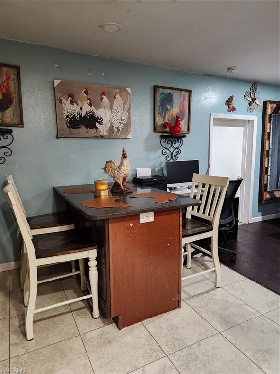 5214 Carlton Street Naples, FL 34113 - Photo 4 of 20 a view of a dining room with furniture