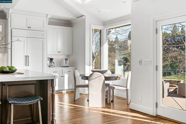 a bathroom with a sink toilet a mirror and shower