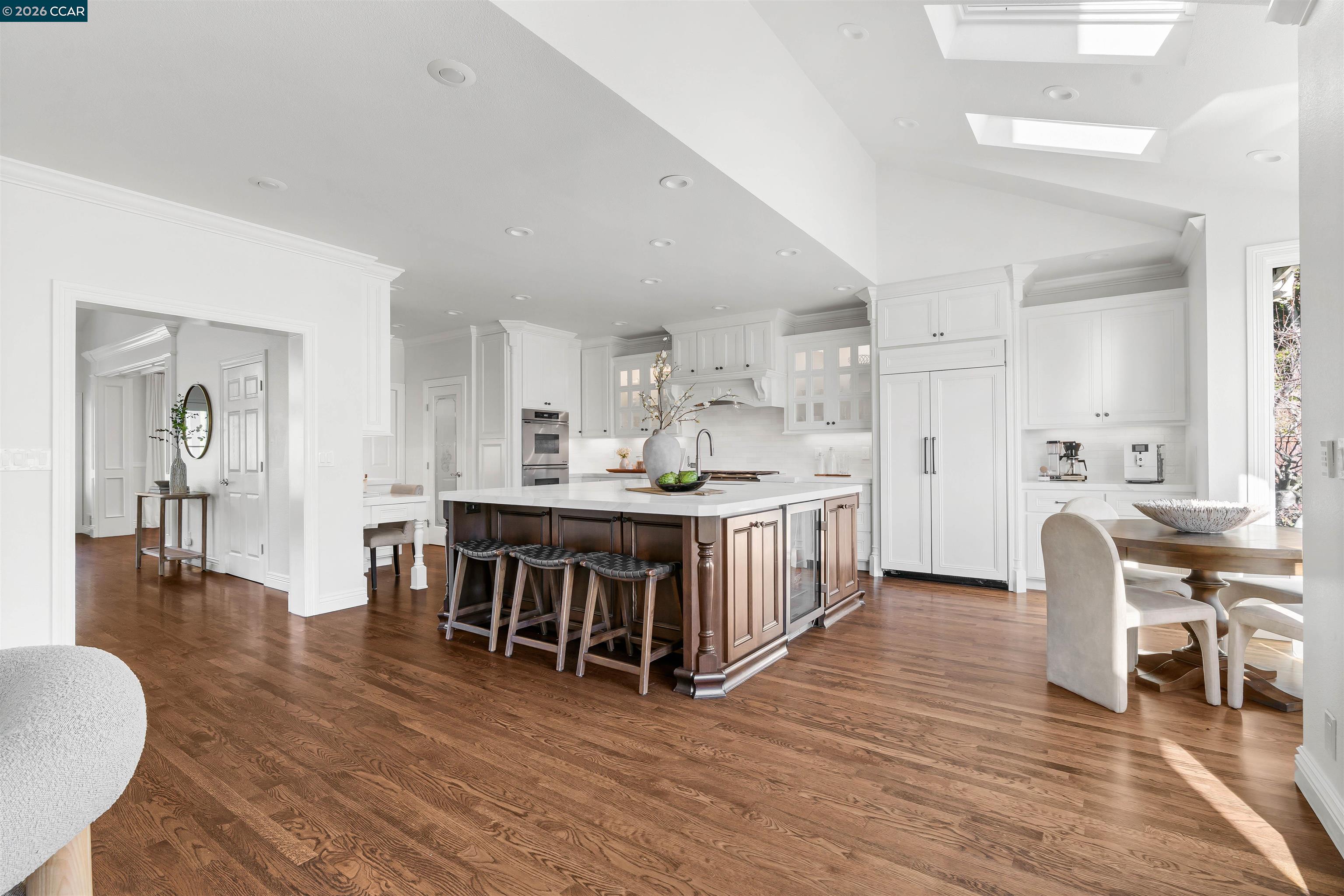 138 Sunhaven Road Danville, CA 94506 - Photo 18 of 60 a large white dining hall with stainless steel appliances granite countertop a dining table chairs and view living room