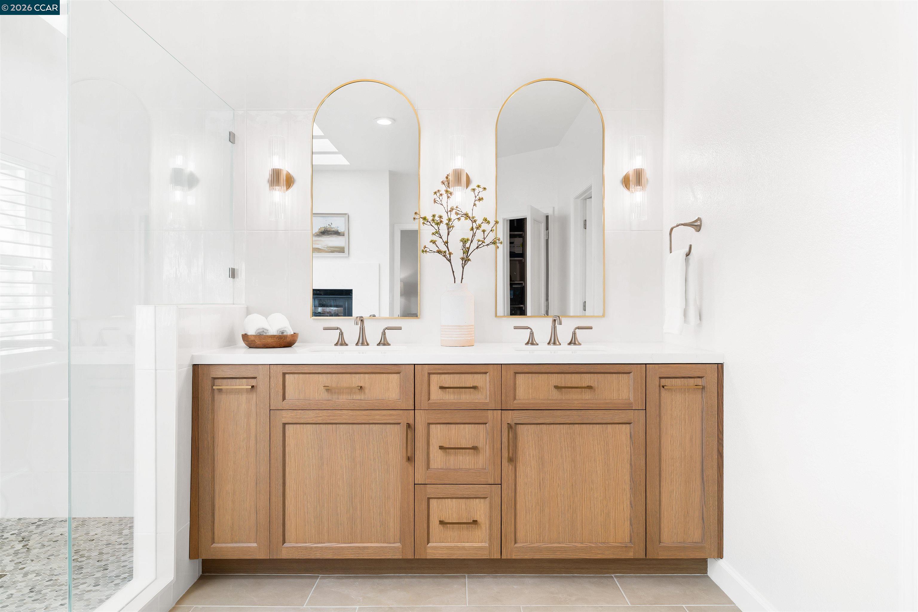 138 Sunhaven Road Danville, CA 94506 - Photo 36 of 60 a spacious bathroom with a double vanity sink and a mirror